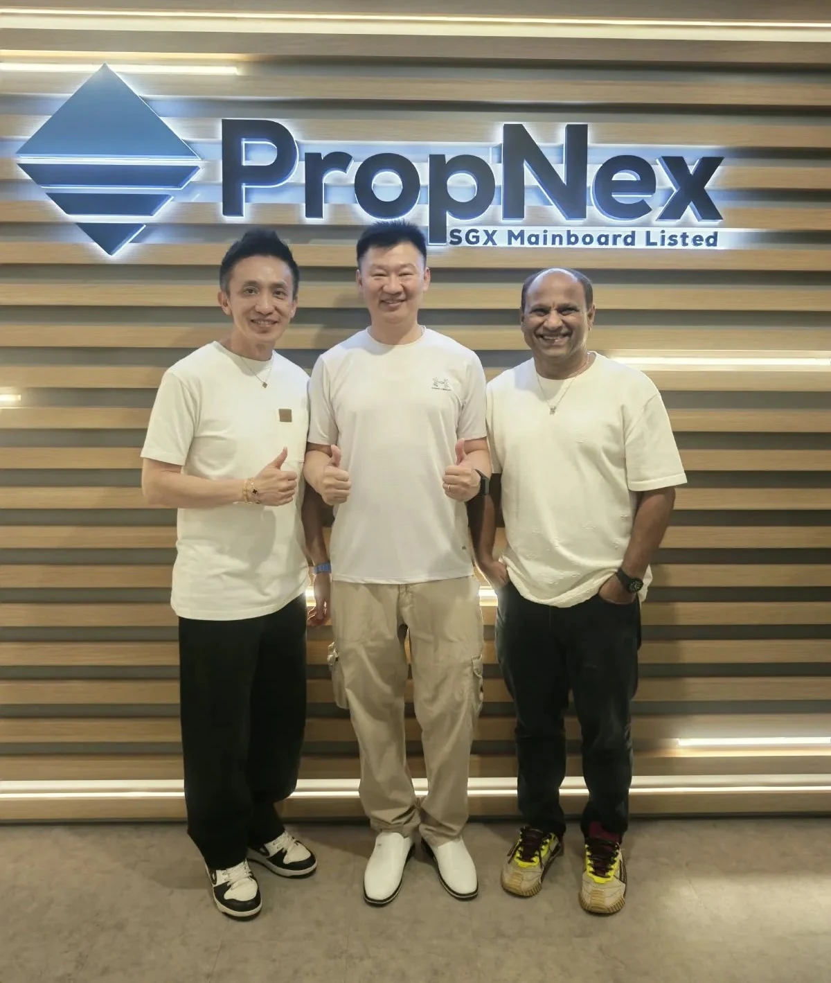 William Tan of Agent W Property with PropNex leadership in Singapore