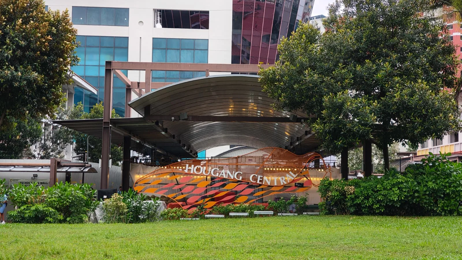 Hougang Central neighbourhood sign and landscaped area