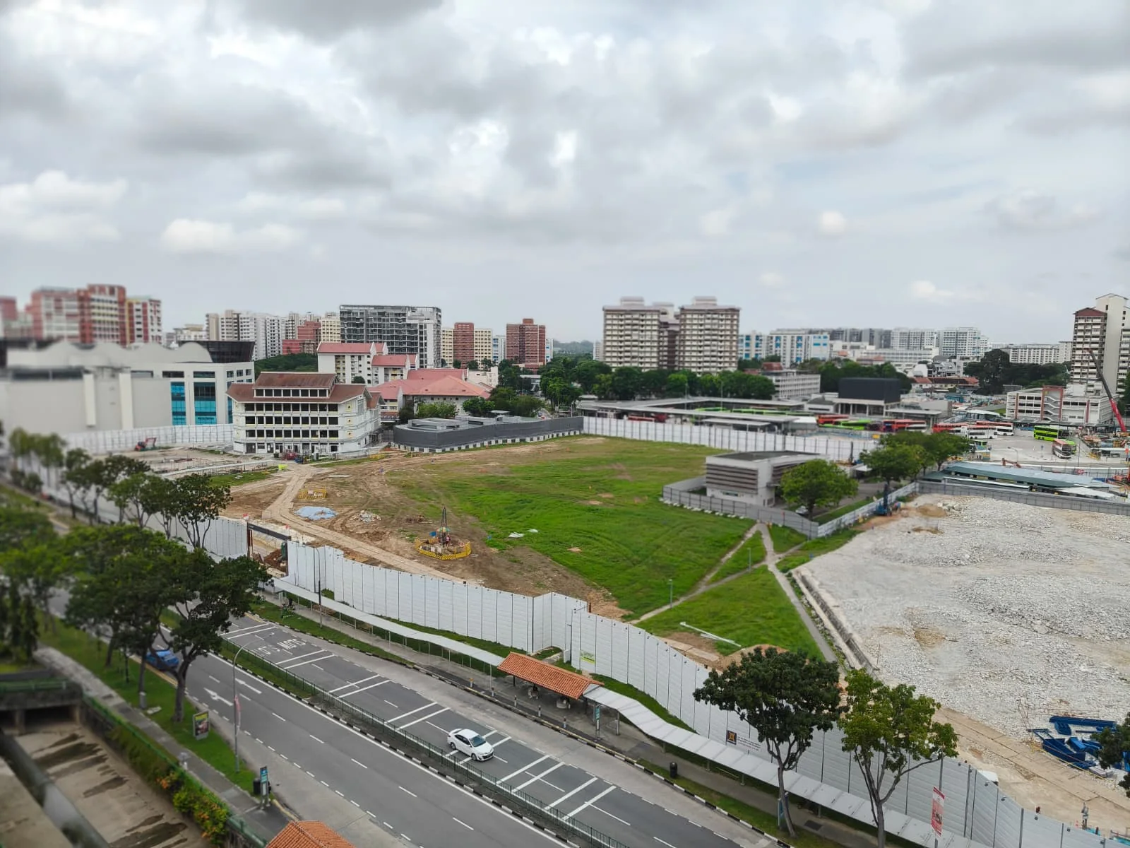 Existing Hougang Central development site and surrounding town environment